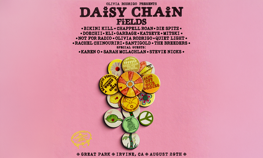 Daisy Chain Fields music festival poster on pink, with a daisy made of colorful buttons.