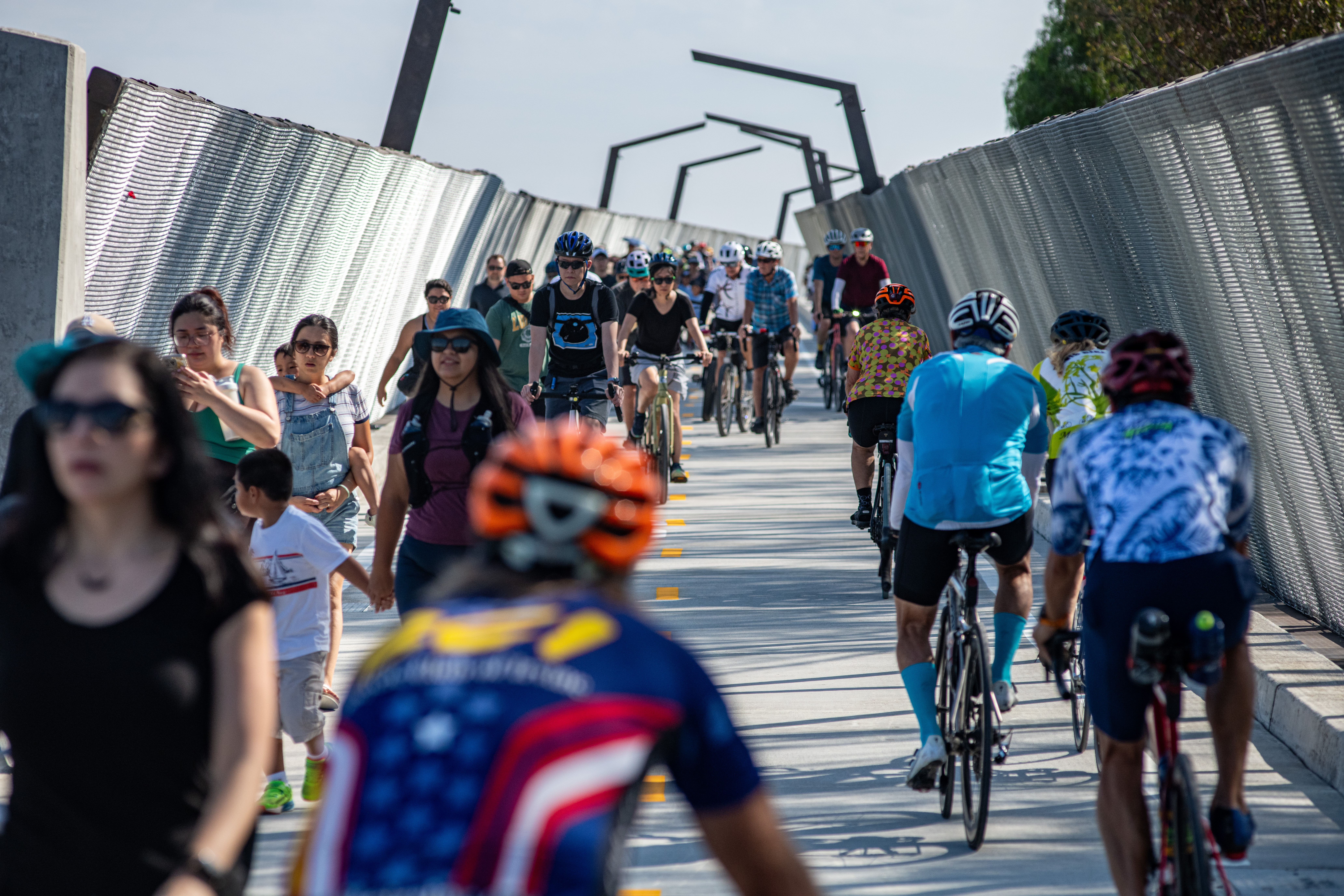 community on bridge during opening