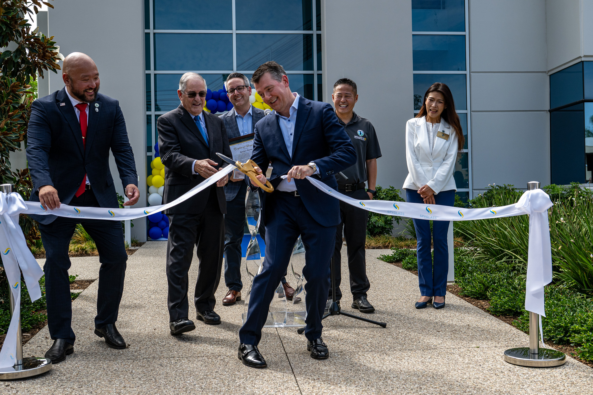 the ribbon is cut on the new headquarters of SpyGlass Pharma