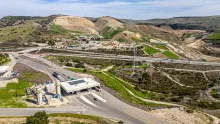Frank R. Bowerman Landfill with green hills in the background.