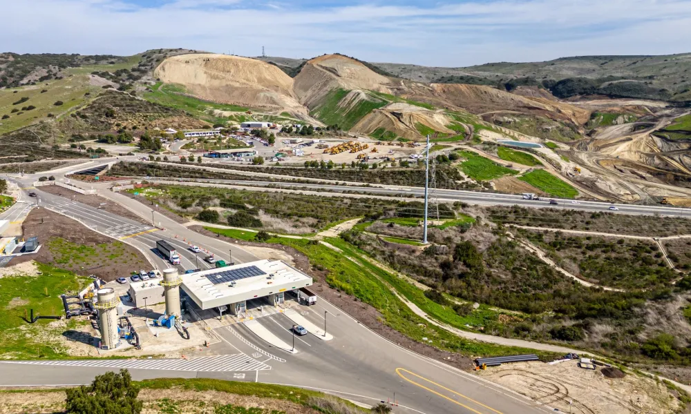 Frank R. Bowerman Landfill with green hills in the background.