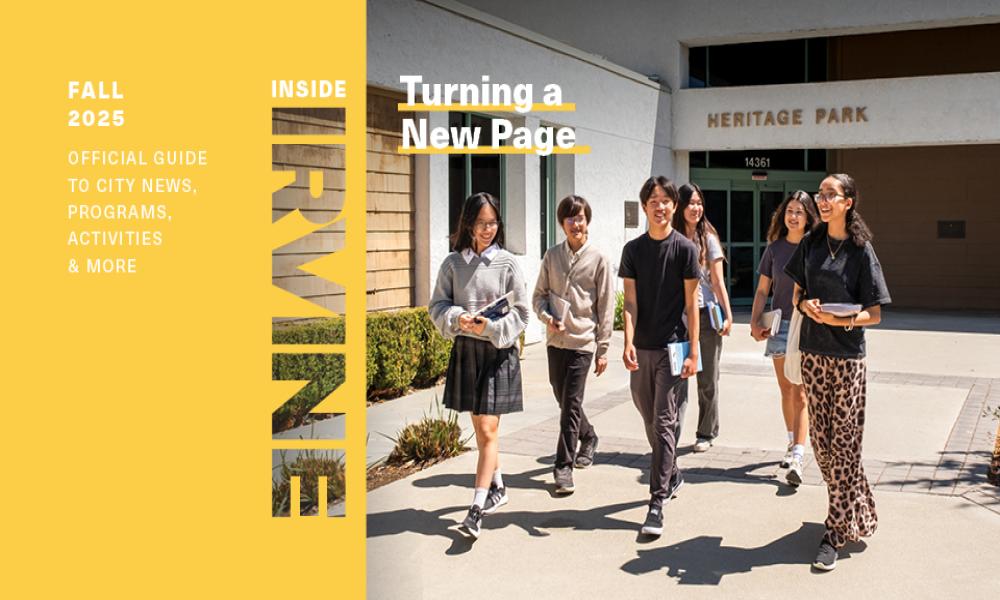 Diverse students walk past Heritage Park building on a sunny day.
