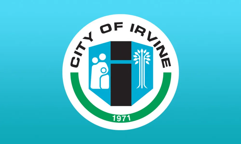 City of Irvine flag: light blue, central logo with family, tree, and "CITY OF IRVINE 1971".