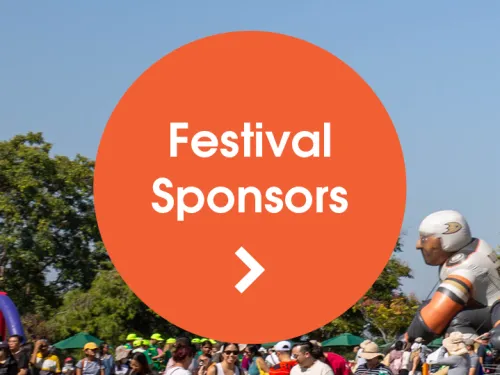 "Festival Sponsors" button over Crowd at a sunny outdoor festival