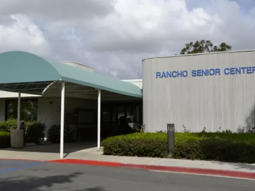 Rancho Senior Center building with a turquoise entrance awning.