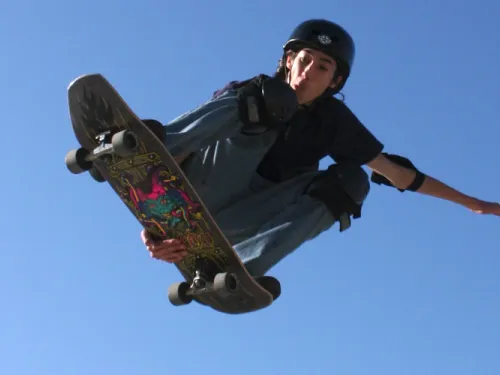 skateboarder doing a trick in the air