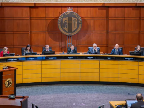 Great Park Board of 7 members sitting at a dais conducting business