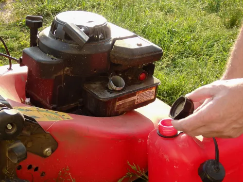 gas-powered lawn mower on a lawn